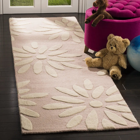 Safavieh Safavieh Kids 2'-6" x 10'-0" Rug in Pink / Ivory