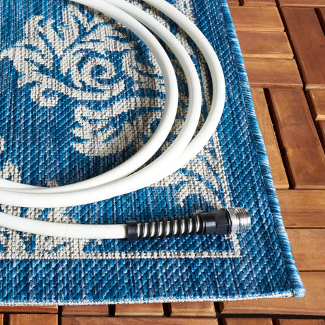 Safavieh Courtyard 5'-3" x 7'-7" Rug in Navy / Grey