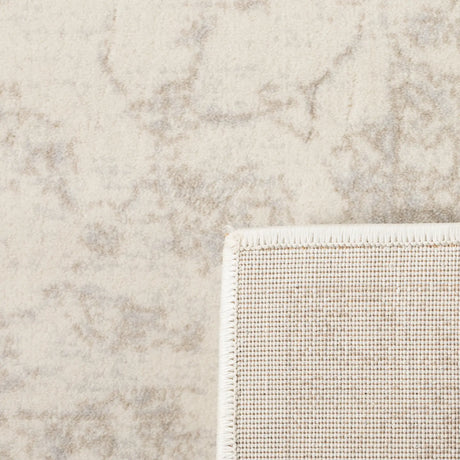 Safavieh Carnegie 5'-1" x 7'-6" Rug in Cream / Light Grey