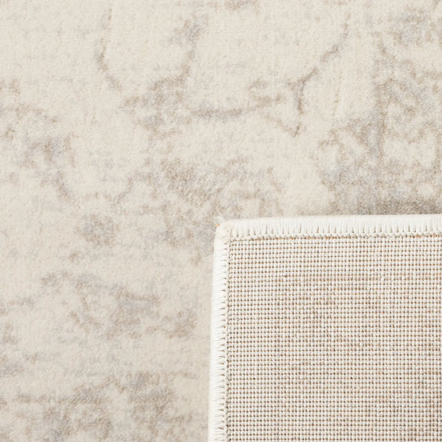 Safavieh Carnegie 5'-1" x 7'-6" Rug in Cream / Light Grey