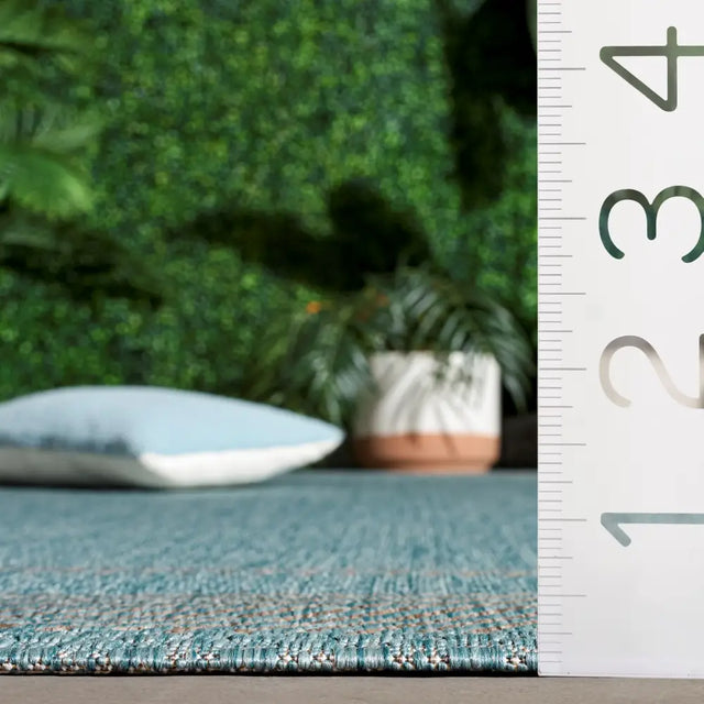 Safavieh Courtyard 5'-3" x 7'-7" Rug in Aqua / Grey