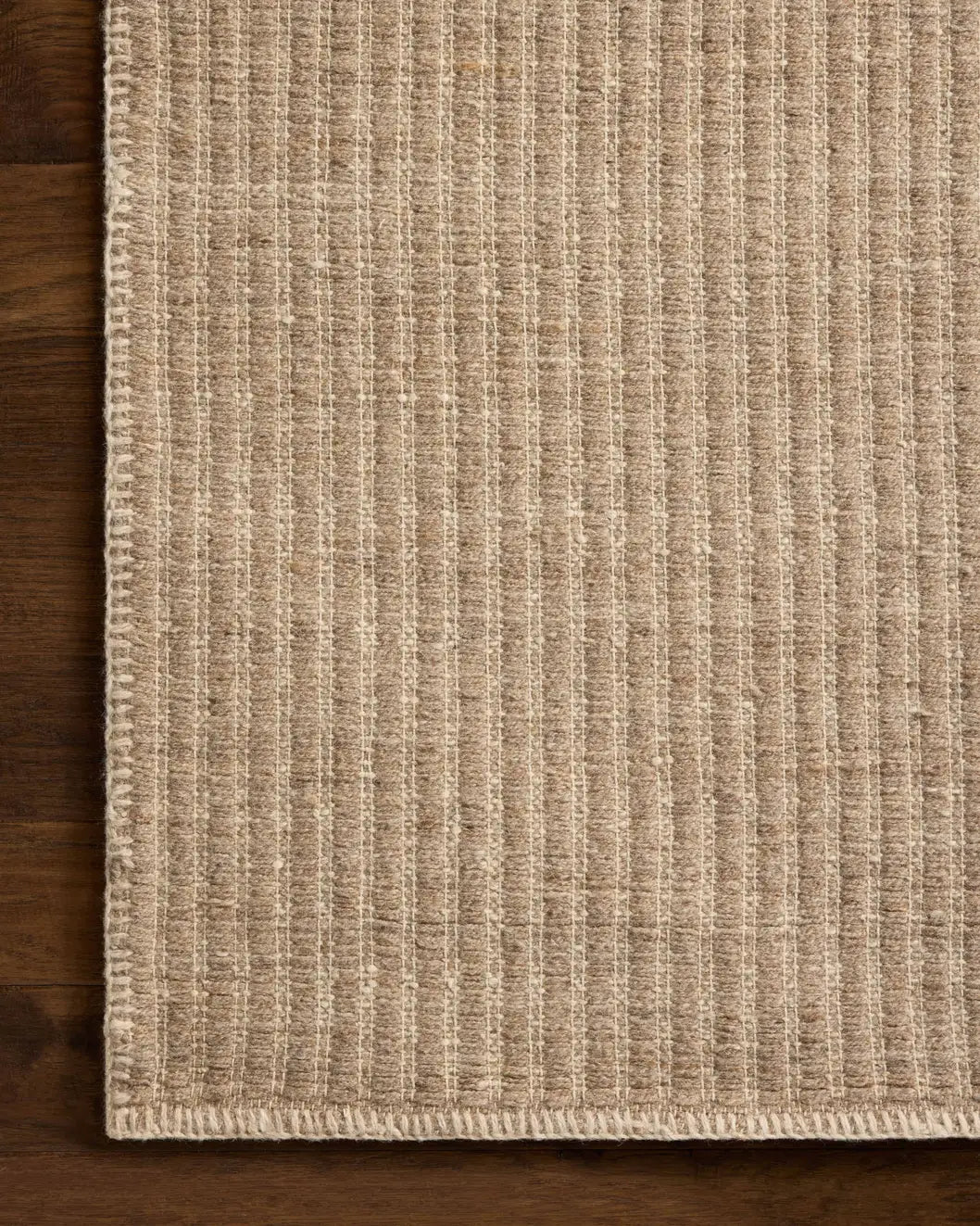 Loloi Elma ELM-01 Contemporary Hand Woven Dove Rug - corner on wood