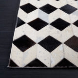 Safavieh Studio Leather 4'-0" x 6'-0" Rug in Beige / Black