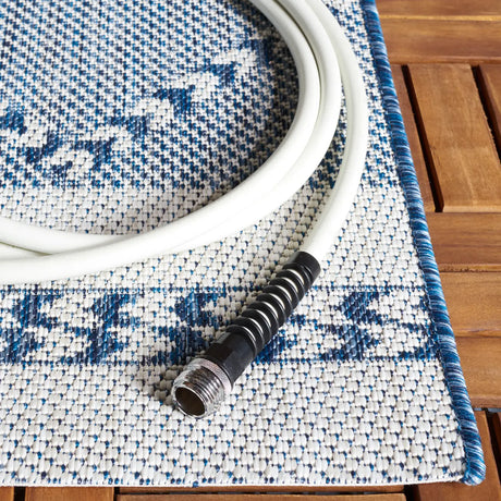 Safavieh Courtyard 4'-0" x 5'-7" Rug in Navy / Ivory