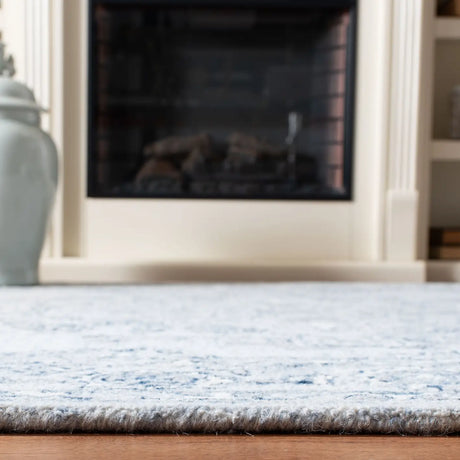 Safavieh Micro-Loop 4'-0" x 6'-0" Rug in Light Blue / Ivory
