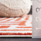 Safavieh Amsterdam 5'-1" x 7'-6" Rug in Ivory / Terracotta
