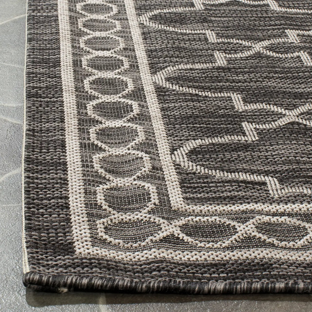 Safavieh Courtyard 5'-3" x 7'-7" Rug in Black / Beige