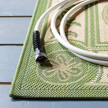 Safavieh Courtyard 5'-3" x 7'-7" Rug in Natural / Olive