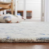 Safavieh Micro-Loop 5'-0" x 8'-0" Rug in Ivory / Blue