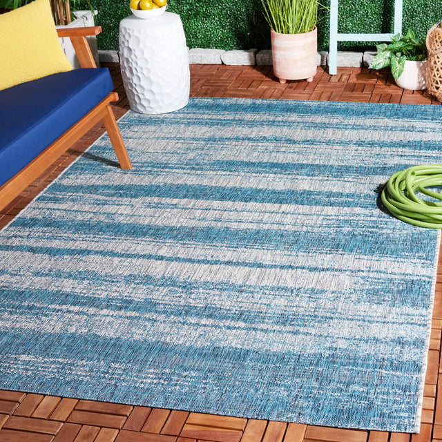 Safavieh Courtyard 5'-3" x 7'-7" Rug in Grey / Teal