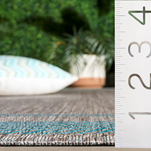 Safavieh Courtyard 5'-3" x 7'-7" Rug in Green / Aqua