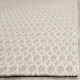 Safavieh Oasis 5'-0" x 8'-0" Rug in Beige / Ivory