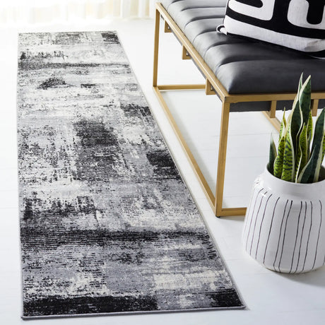 Safavieh Jasper 100 2'-0" x 9'-0" Rug in Black / Ivory