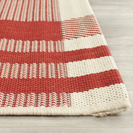 Safavieh Courtyard 6'-7" x 9'-6" Rug in Red / Bone