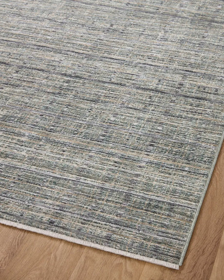 Loloi Soho Soh-04 Jade/Stone Rug - angled corner on wood