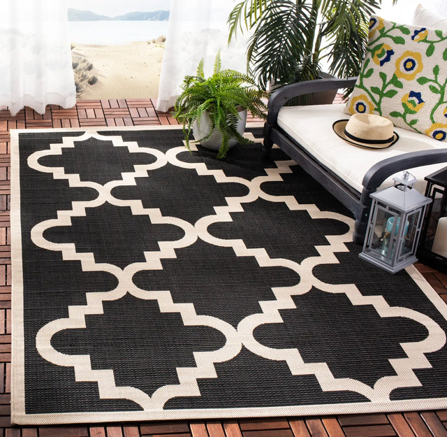 Safavieh Courtyard 5'-3" x 7'-7" Rug in Black / Beige