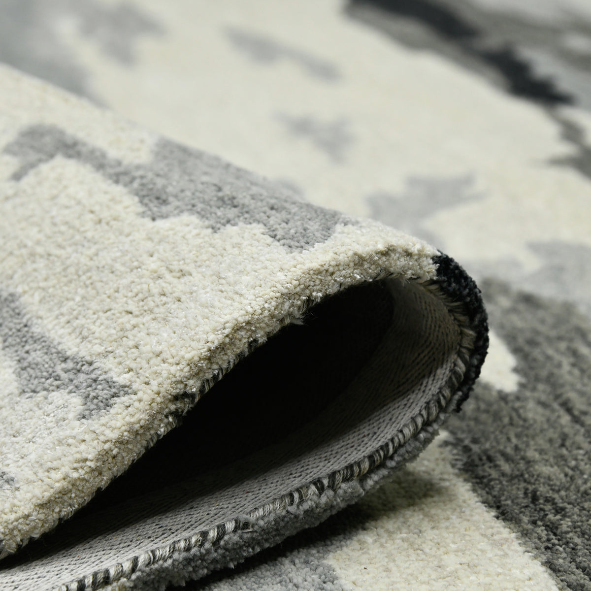 Amer Abstract ABS-6 Dark Gray area rug - rolled view