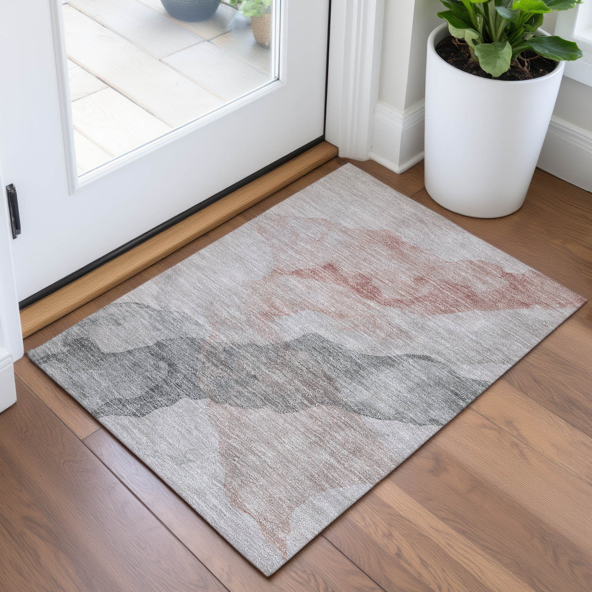 Addison Chantille ACN2109 Abstract Machine Made Transitional Salmon Rug