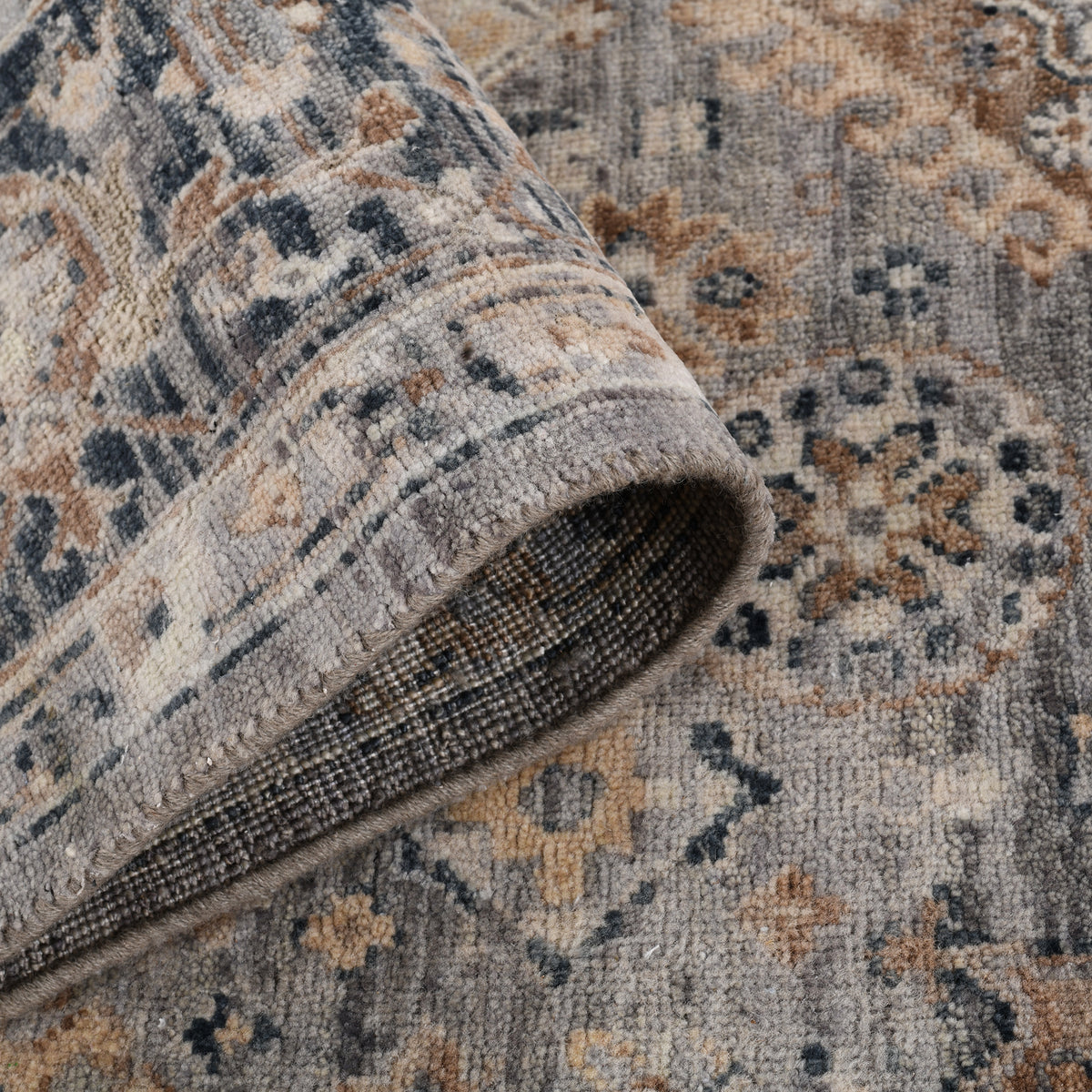 Amer Aurai ARA-19 Coal Gray area rug - rolled view