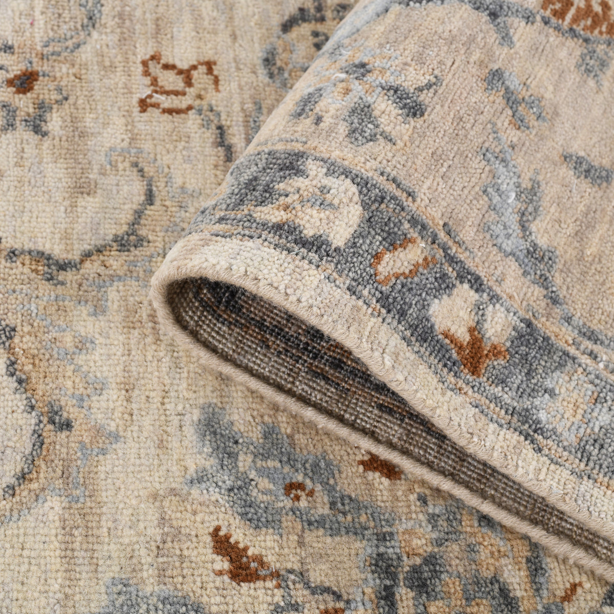 Amer Aurai ARA-22 Ivory area rug - rolled view