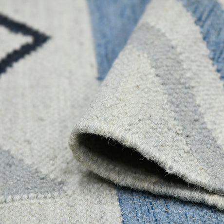 Amer Artifacts ARI-14 Sky Blue area rug - rolled view