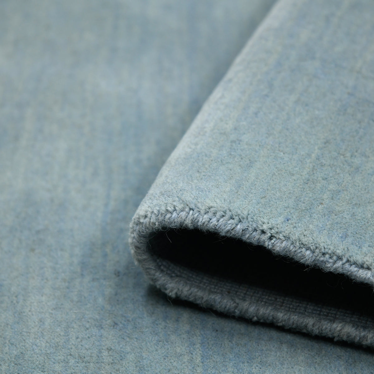 Amer Arizona ARZ-4 Polo Blue area rug - rolled view
