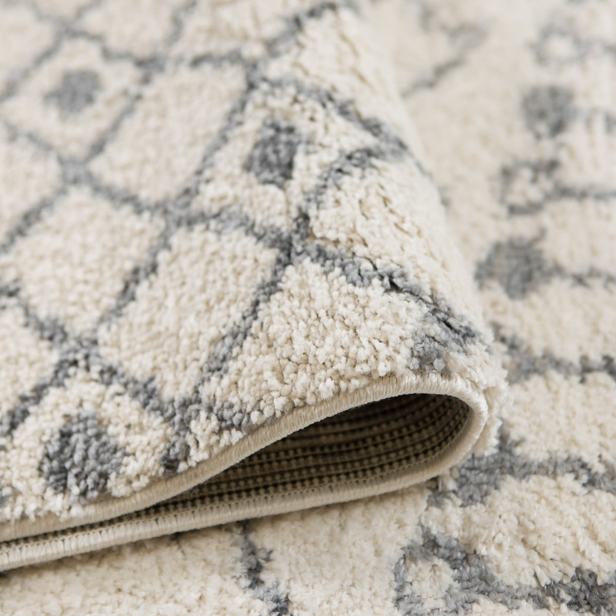 Amer Aspen ASP-1 Ivory area rug - rolled view