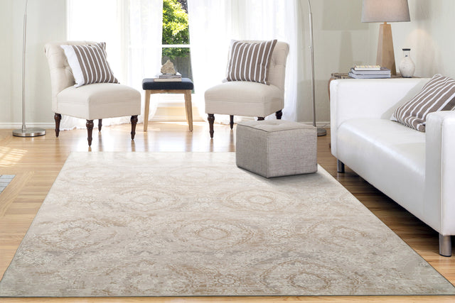 Beige abstract transitional area rug with distressed swirls, rectangular