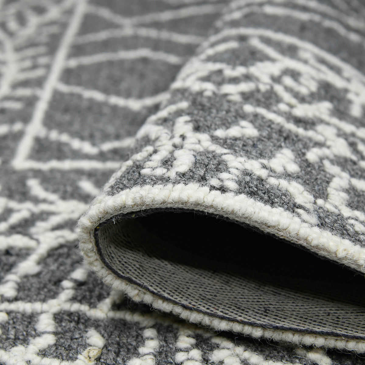 Amer Berlin BER-5 Dark Gray area rug - rolled view