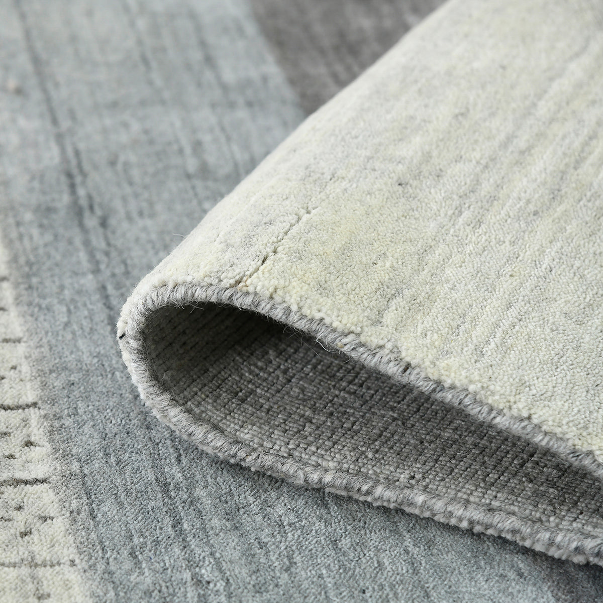 Amer Blend BLN-2 Ivory area rug - rolled view