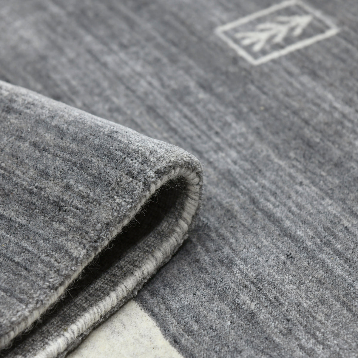 Amer Blend BLN-5 Charcoal area rug - rolled view