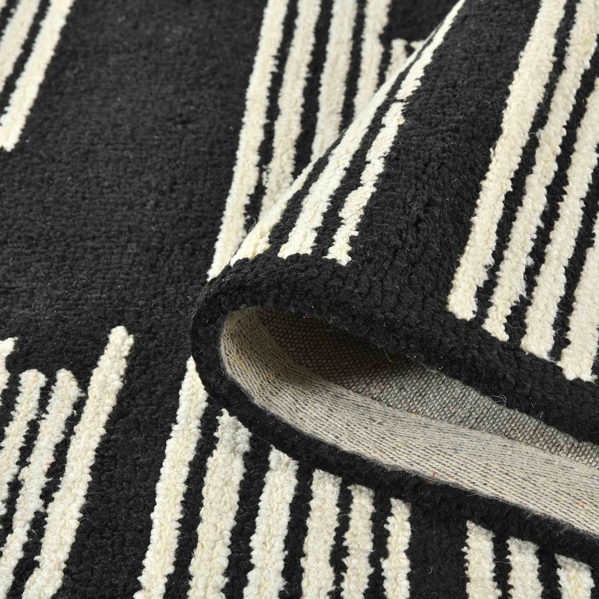 Amer Chicago CHI-6 Ebony area rug - rolled view