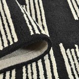 Amer Chicago CHI-6 Ebony area rug - rolled view