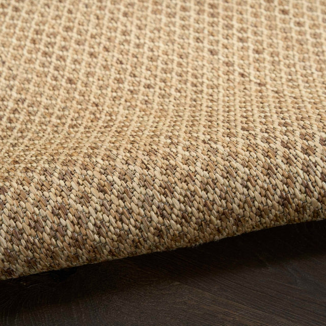 Jute rug pile with tight woven texture and subtle edge border