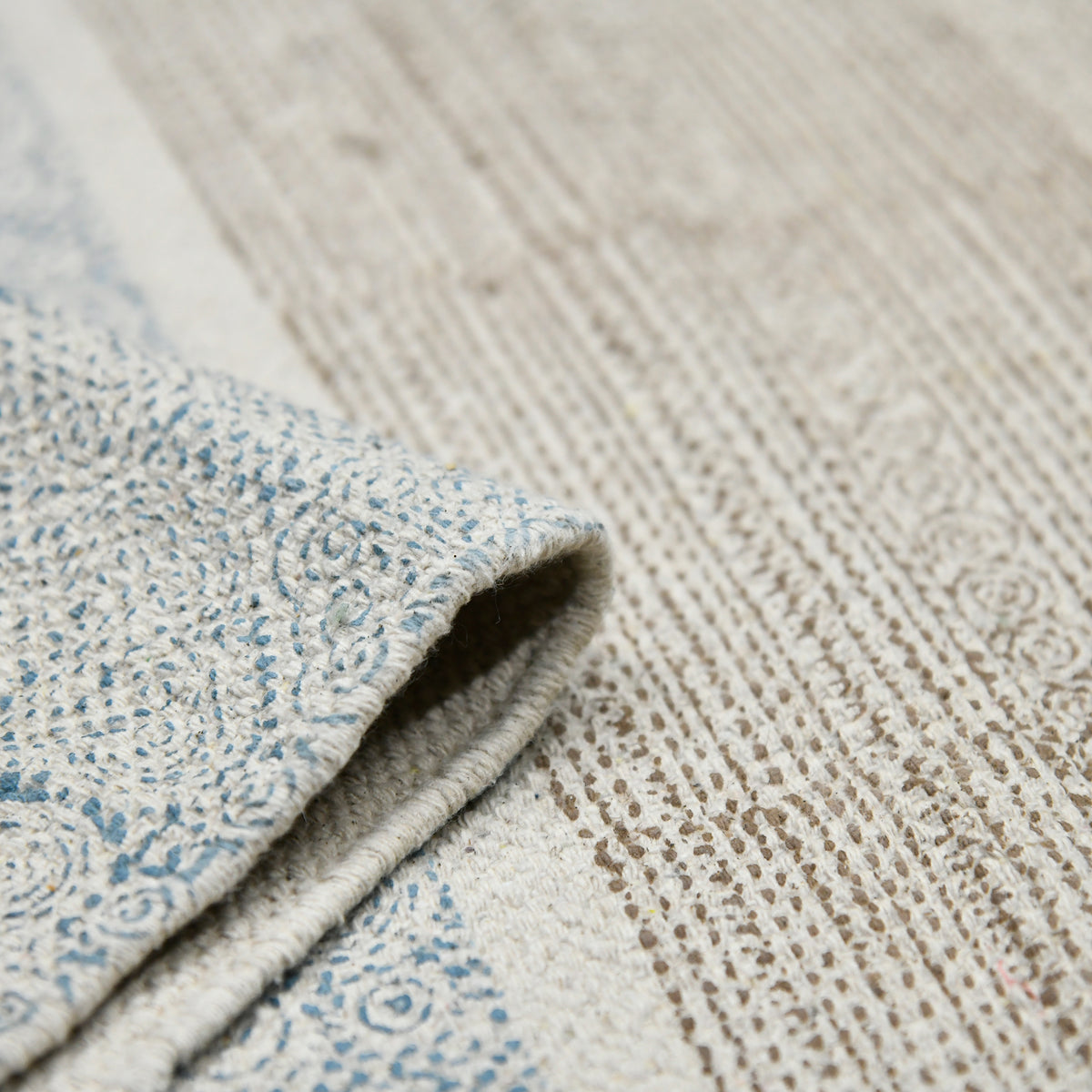 Amer Dune DUN-4 Stone Blue area rug - rolled view