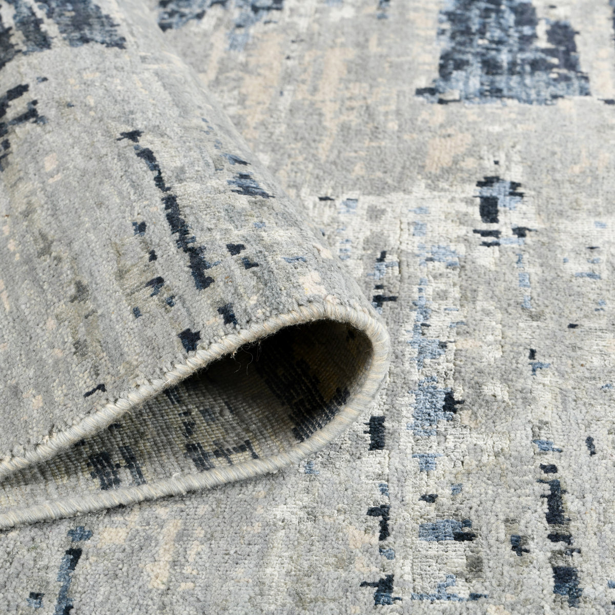 Amer Ensemble ENS-3 Spindle area rug - rolled view