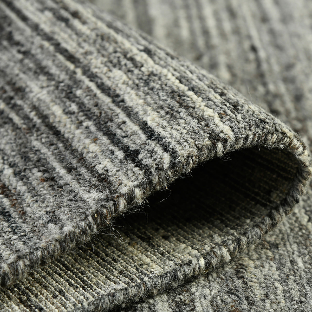 Amer Heaven HEA-6 Dark Gray area rug - rolled view