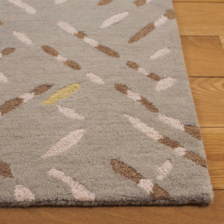 Safavieh Metro Met252E Taupe/Pink Rug.