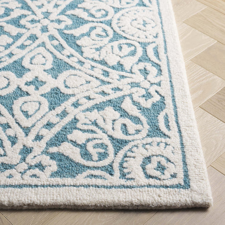 Safavieh Metro Met256L Teal/Ivory Rug.