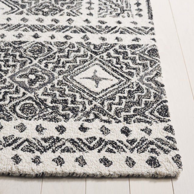 Safavieh Micro-Loop Mlp803Z Black/Ivory Rug.