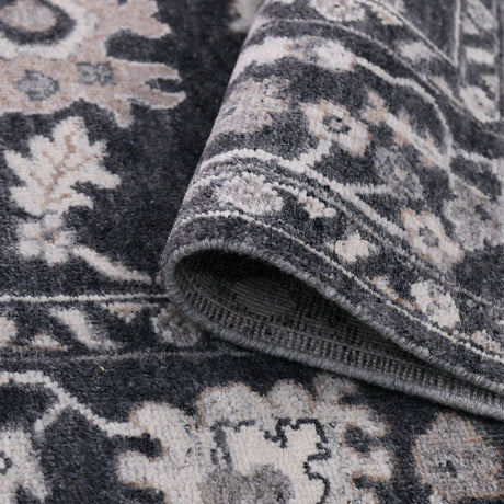 Amer Marlow 2026-03-06 00:00:00 Dark Gray area rug - rolled view