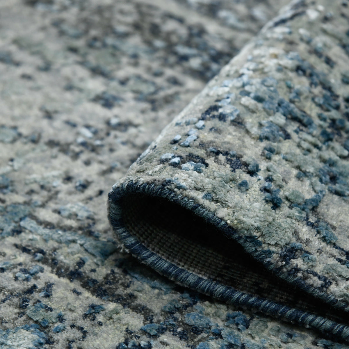Amer Mystique MYS-25 Polo Blue area rug - rolled view