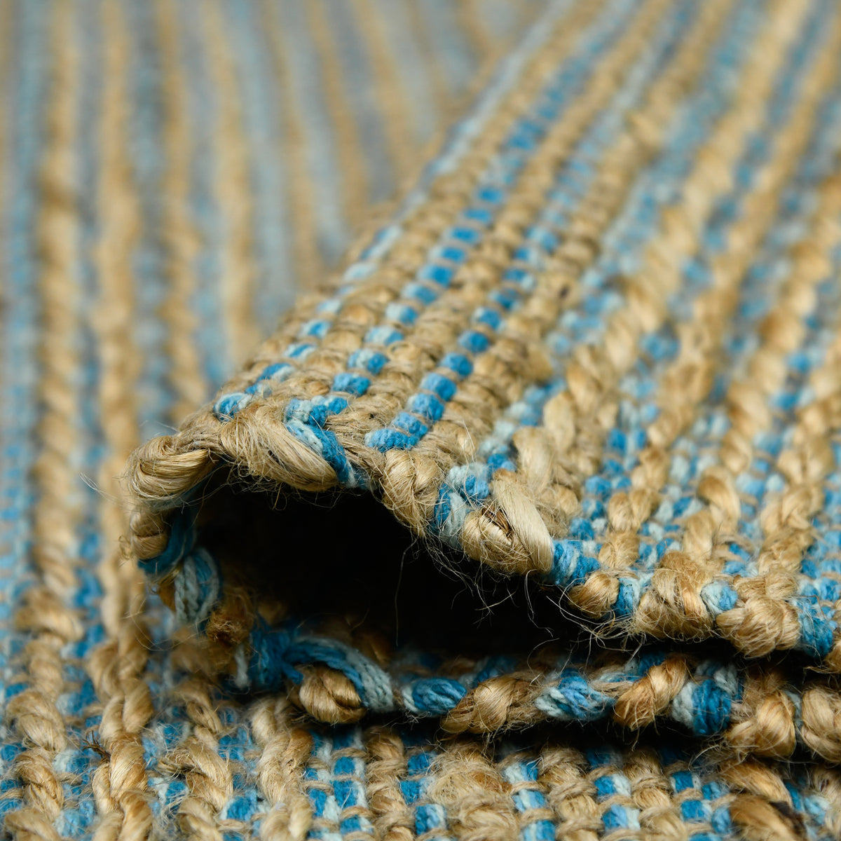 Amer Naturals NAT-1 Blue area rug - rolled view