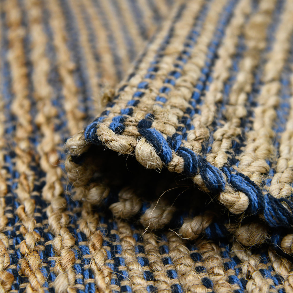 Amer Naturals NAT-7 Navy area rug - rolled view