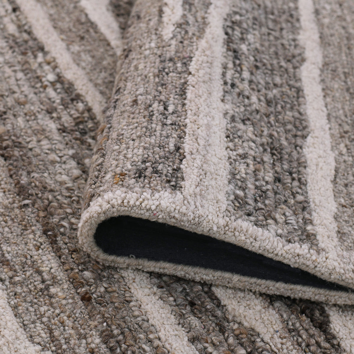Amer Nimbus NIM-7 Beige Brown area rug - rolled view