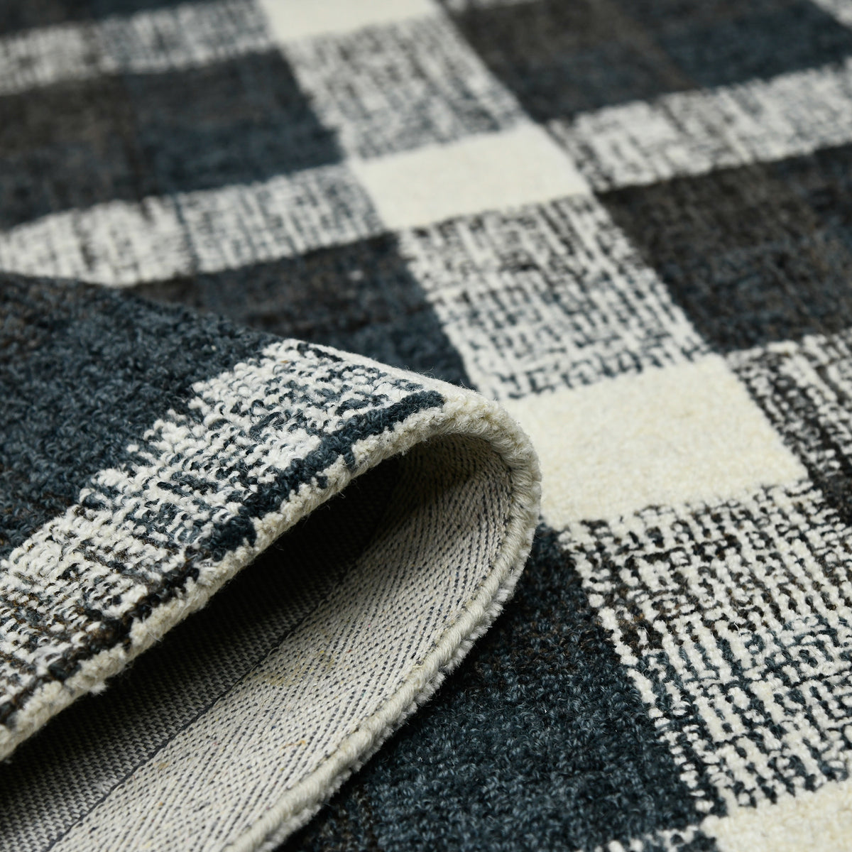 Amer Tartan TRA-6 Charcoal area rug - rolled view