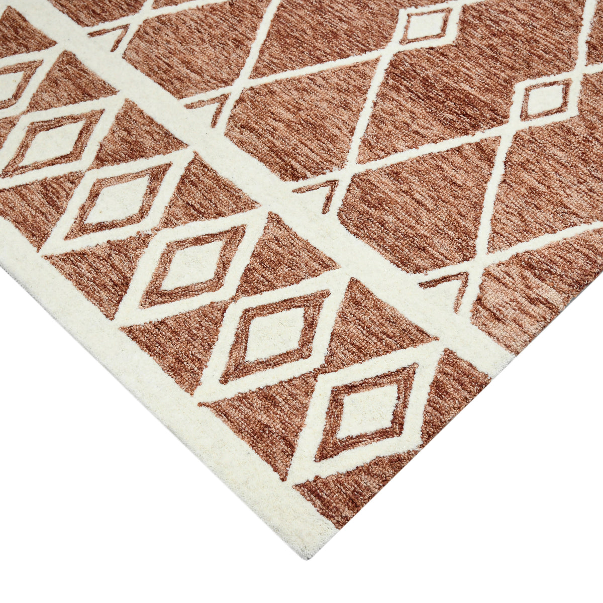 Rust geometric area rug with cream outlined star and lattice motif