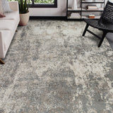 Contemporary rectangular area rug with light gray and beige distressed pattern.