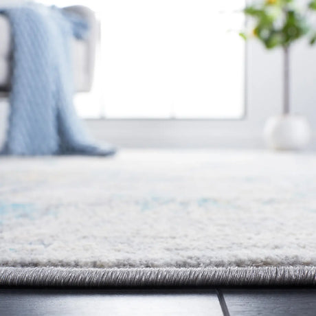 Safavieh Jasper 100 4'-0" x 6'-0" Rug in Ivory / Blue