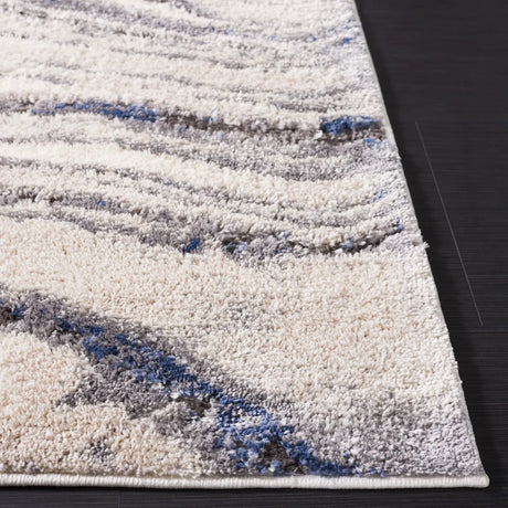 Safavieh Petra 4'-0" x 6'-0" Rug in Light Beige / Blue